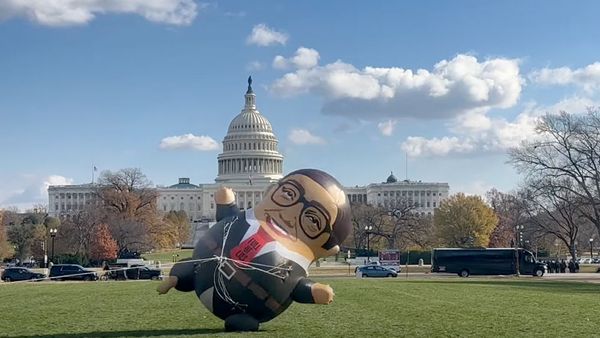 Watch: A Giant George Santos Balloon Flies in Anticipation of Him Floating Away from Relevancy