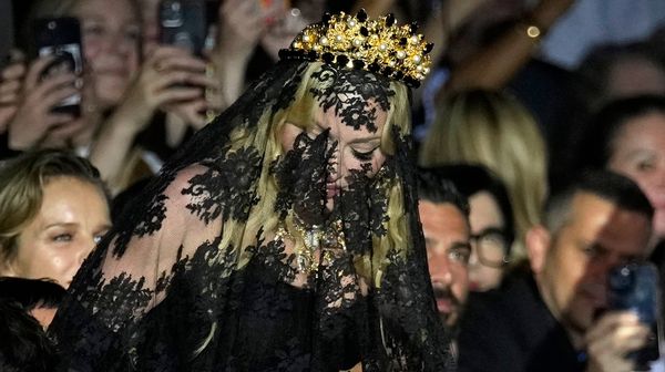 Madonna Makes Veiled Entrance to Dolce&Gabbana for Show Celebrating her 1990s Heyday